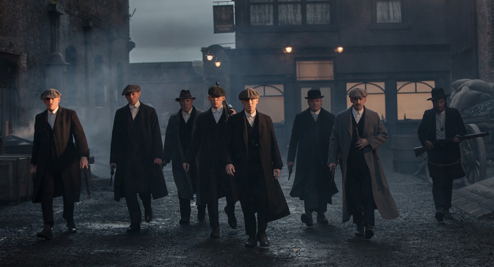 Programme Name: Peaky Blinders - TX: 12/09/2013 - Episode: 1 (No. 1) - Embargoed for publication until: n/a - Picture Shows: John Shelby (Joe Cole), Thomas Shelby (Cillian Murphy), Arthur Shelby (Paul Anderson), Jeremiah Jesus (Benjamin Zephaniah) - (C) Tiger Aspect - Photographer: Robert Viglasky